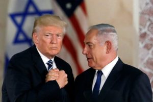 FILE PHOTO - U.S. President Donald Trump and Israeli Prime Minister Benjamin Netanyahu shake hands after Trump's address at the Israel Museum in Jerusalem